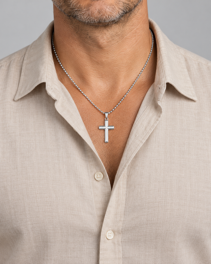 Man wearing the Cross necklace, silver-tone finish
