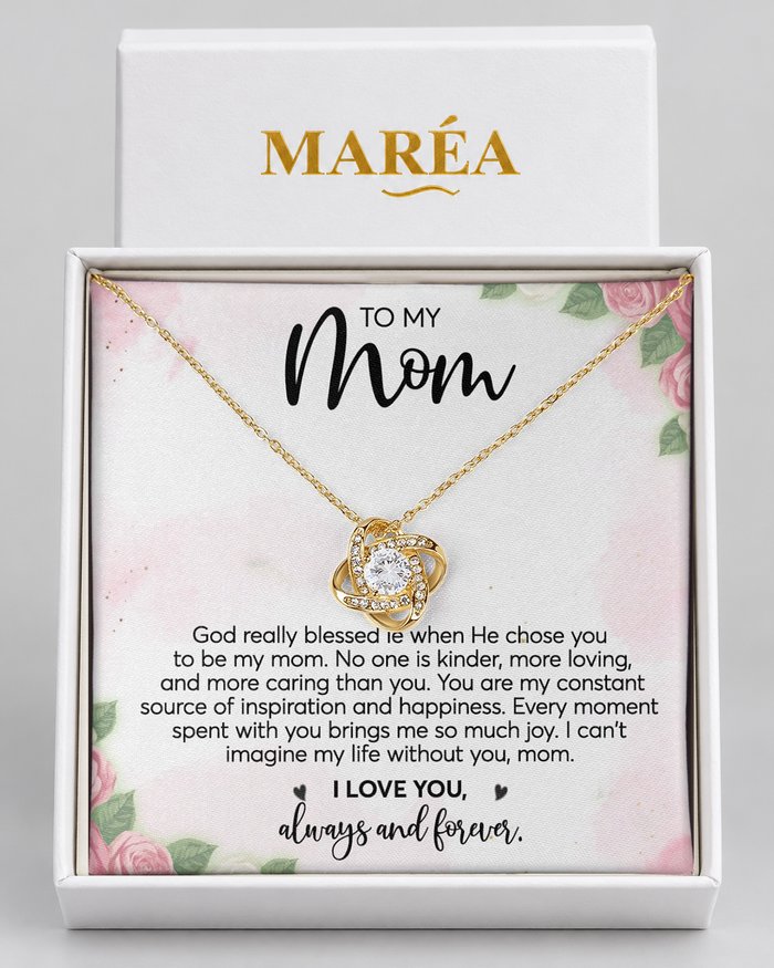 Love Knot necklace in a MARÉA gift box with message card, gold-tone finish