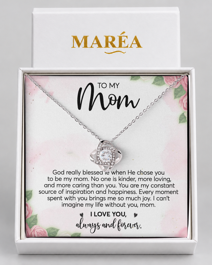 Love Knot necklace in a MARÉA gift box with message card, silver-tone finish