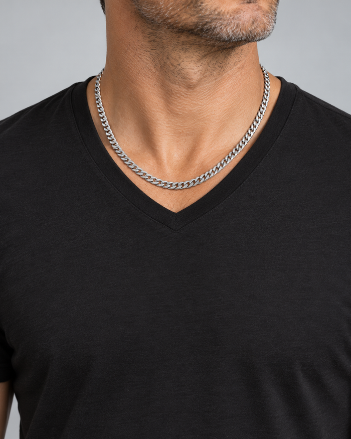 Man wearing the Cuban Chain necklace, silver-tone finish