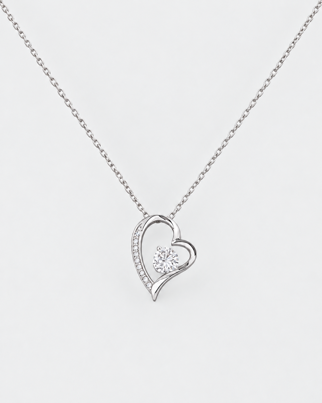 Forever Love necklace in silver-tone stainless steel on a light grey background